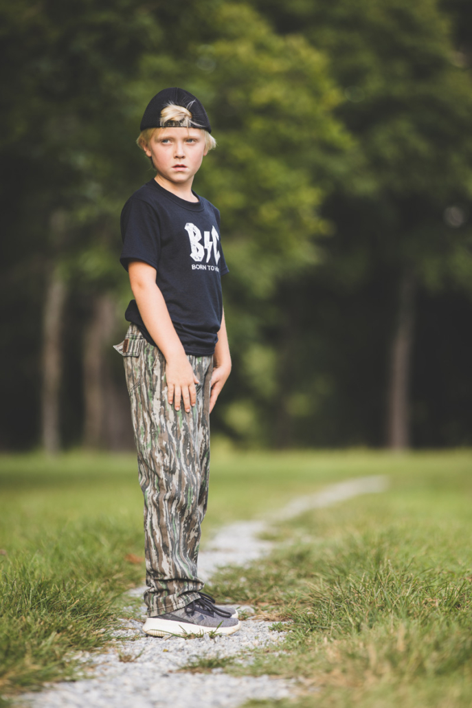 youth playing in bc raskulls camo twill pants, born to hunt tee and camo mesh cap