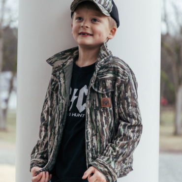 bc raskulls trappers quilted jacket, mesh youth cap and born to hunt tee smiling child