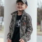 bc raskulls trappers quilted jacket, mesh youth cap and born to hunt tee smiling child